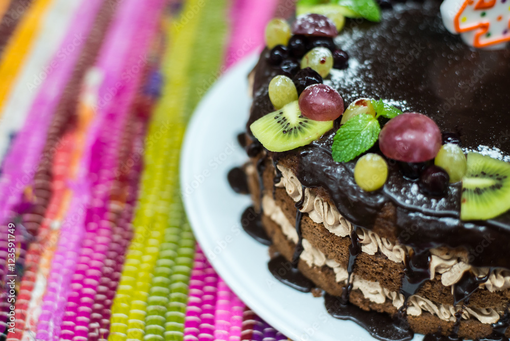 Cake for birthday, number four made of sugar. Cake decorated with berries and fruits. Cake for birthday, number four made of sugar. Cake decorated with berries and fruits.