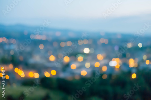 blurred city light at sunset © moomusician
