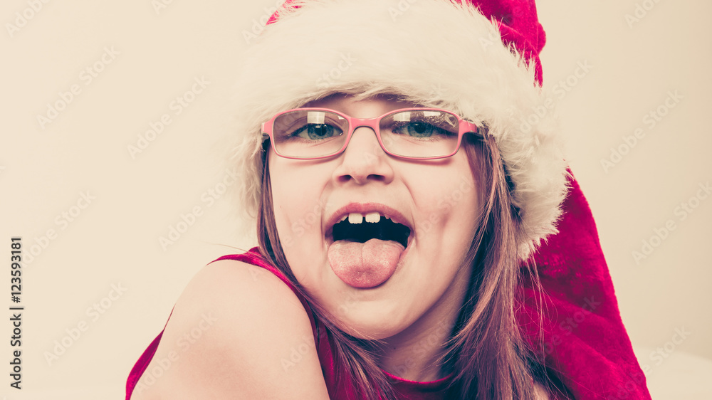 Little girl looking like santa elf. Little girl looking like santa elf.