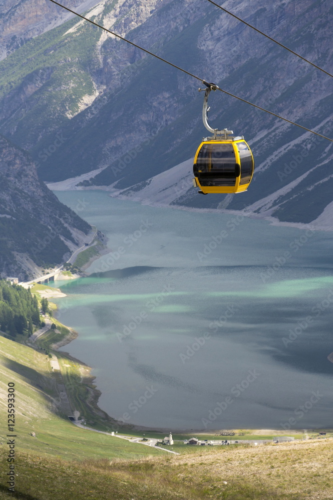 Cable car gondola in Alps mountains near Livigno lake Italy Cable car gondola in Alps mountains near Livigno lake Italy