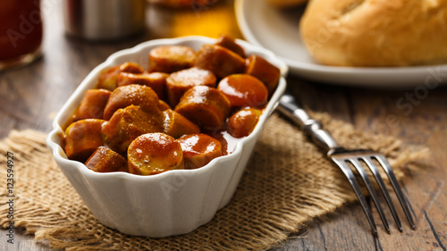Photos Currywurst - fried sausage with ketchup