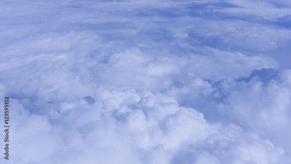 Sky clouds.  Over the Clouds.  Cloudscape. Blue sky and white cl