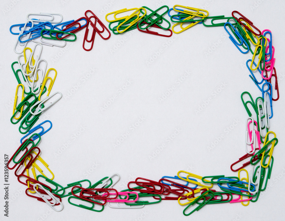 Frame of colorful paper clips isolated in white Frame of colorful paper clips isolated in white