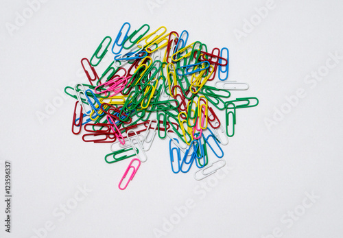 Colorful paper clips isolated in white