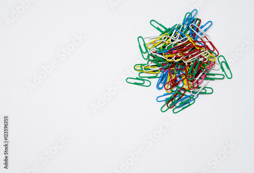 Colorful paper clips isolated in white