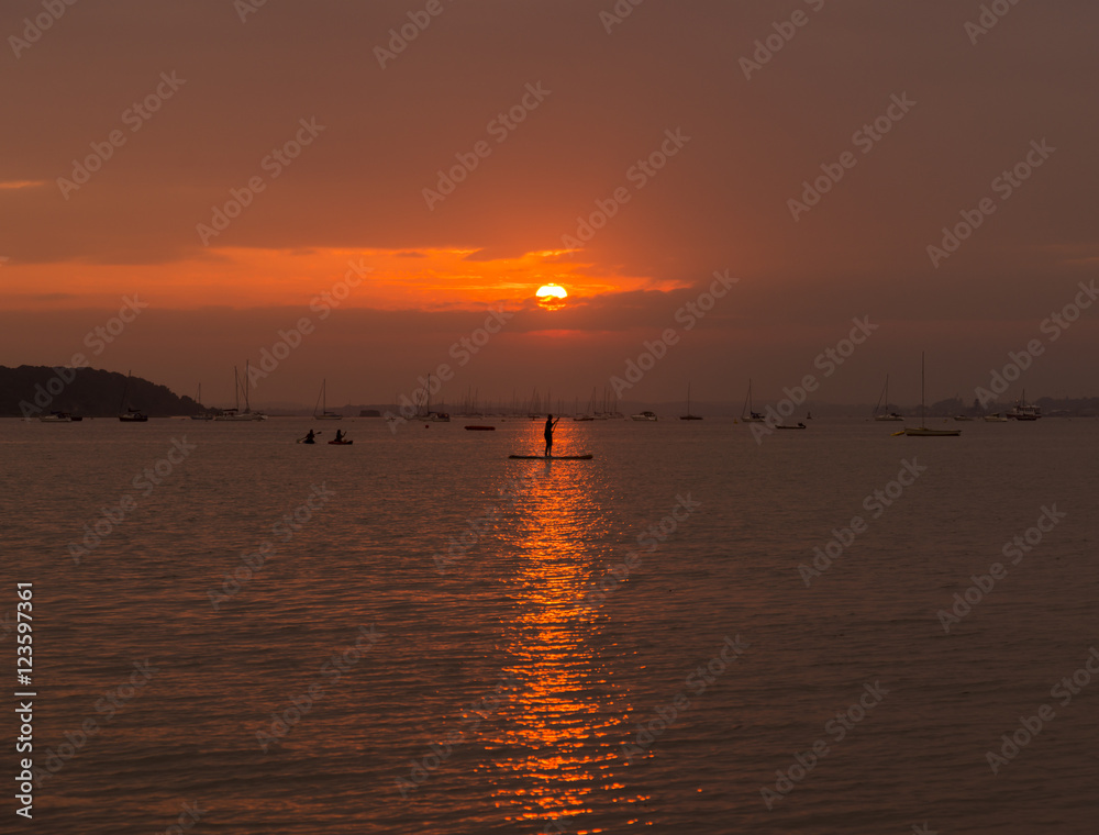Serene sunset over boats at Sandbanks, Poole, Dorset near Bourne