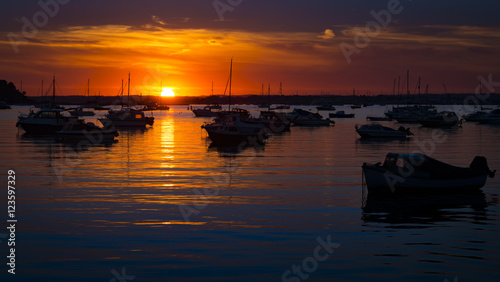 Serene sunset over boats at Sandbanks  Poole  Dorset near Bourne