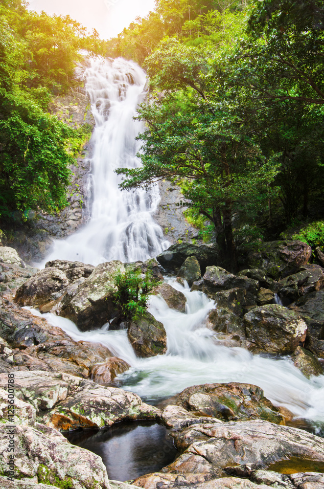 Fototapeta premium Amazing beautiful waterfalls in autumn forest at Sarika Waterfal