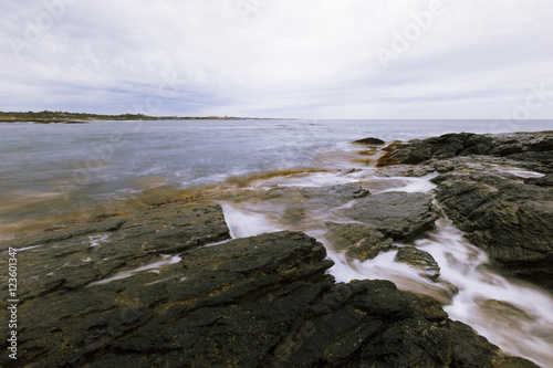 View of the rocky ocean shore © andreiorlov