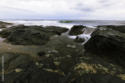 View of the rocky ocean shore