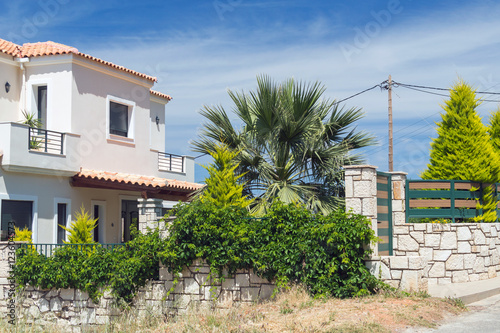 Holiday villa with palm tree on Crete island  Greece