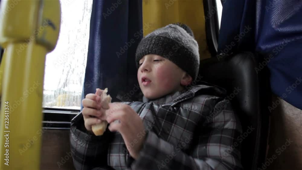 eat sandwiches in the car/boy in the middle of the car eats tasty sandwich eat sandwiches in the car/boy in the middle of the car eats tasty sandwich