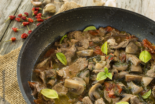 Stufato di manzo e funghi, beef and mushroom stew photo