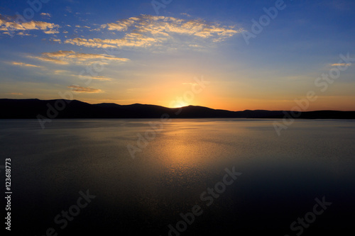 Great lake and sunset views © alozar