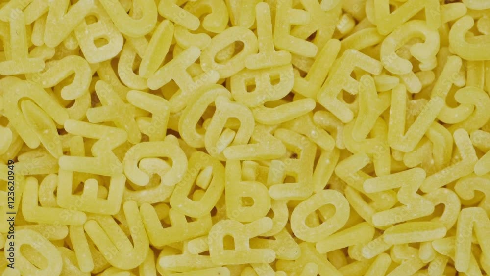 Letters spaghetti by background. 4K.
Letters spaghetti by background. 4K.
