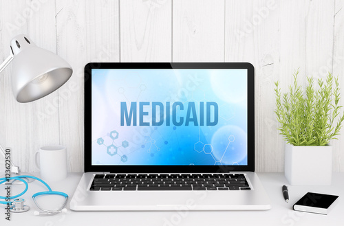 medical desktop computer with medicaid on screen photo
