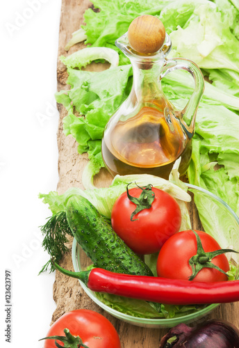 Set vegetable and jug of vegetable oil isolated