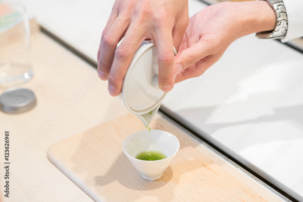 Pouring tea. Chineese tea ceremony
Pouring tea. Chineese tea ceremony