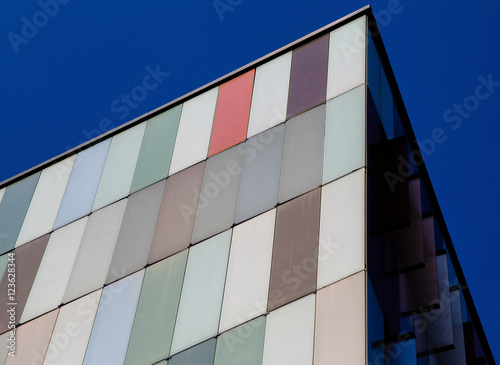 MILAN, ITALY - August 8, 2016: Modern exterior of a colorful office building in Milan, Italy
