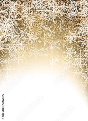 Golden winter background with snowflakes.