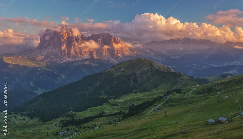 Panoramic view of Sassolungo massif in sunset light, Dolomites, Italy