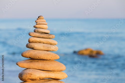 Balanced stones on a beach