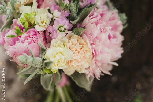 closeup of a bouquet of white, pink and orange flowers