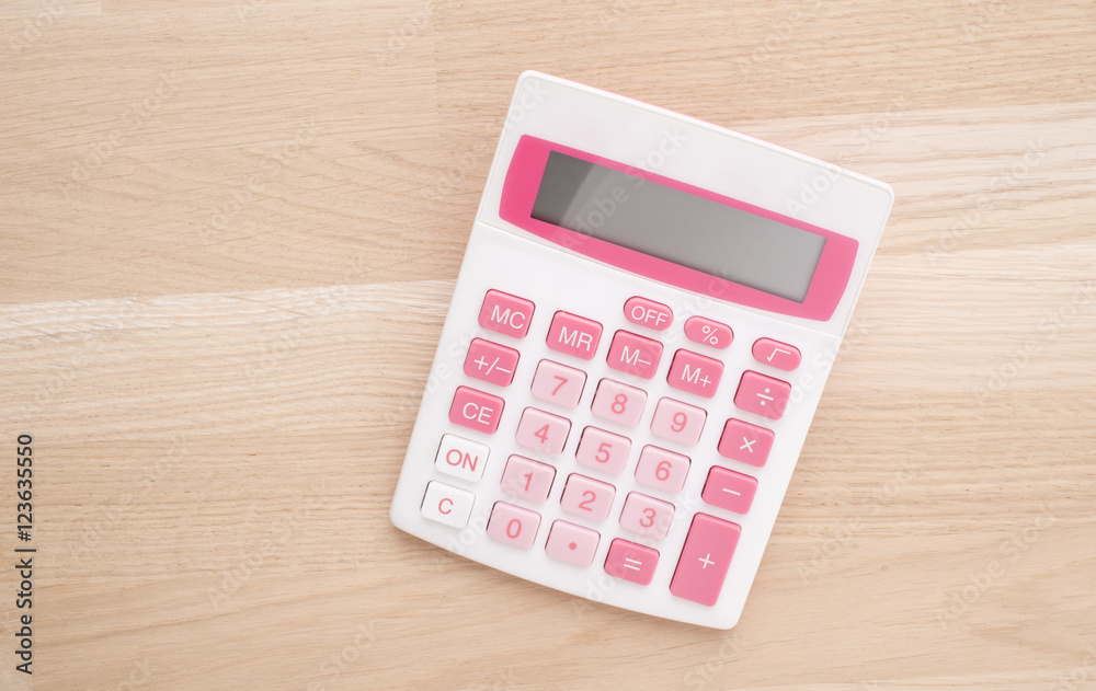 Calculator in office on empty stone table. Concept of financial business, education or household economy. Calculator in office on empty stone table. Concept of financial business, education or household economy.