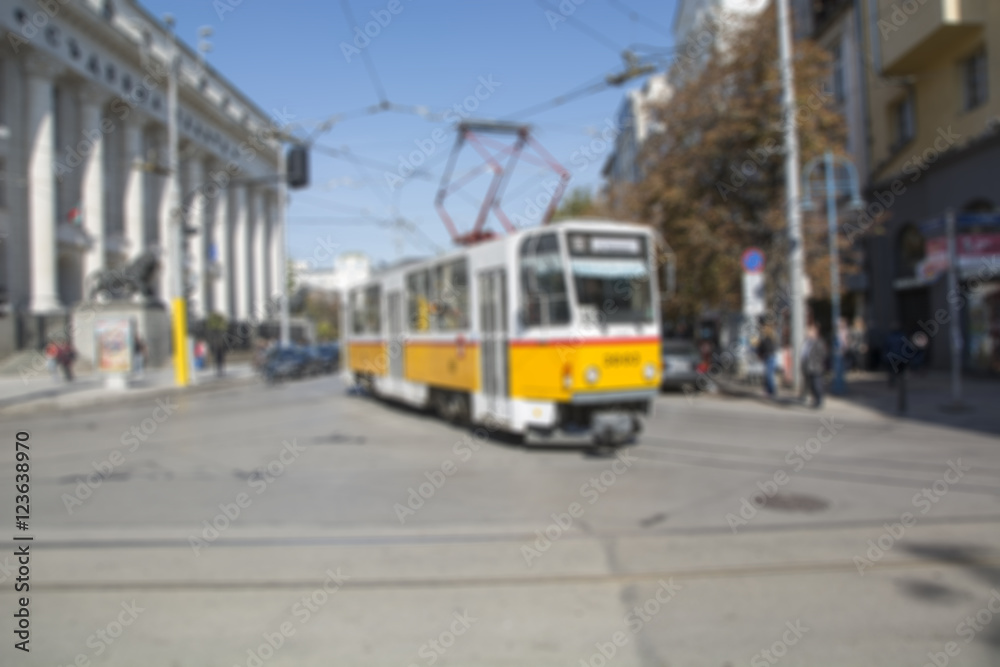 Defocused shot of tram and road traffic
