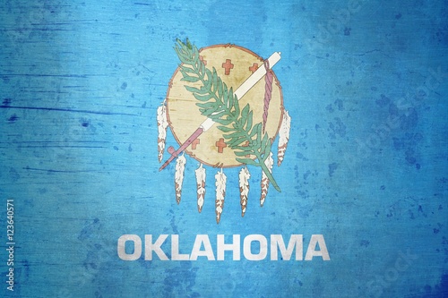 A grunge illustration of the state flag of Oklahoma 