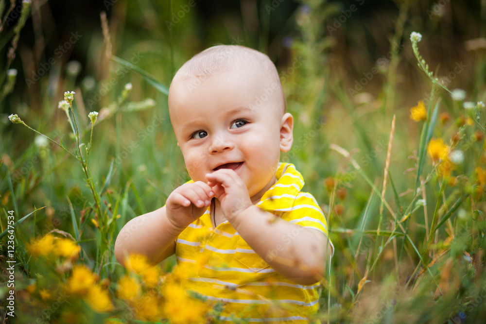 Baby on green grass