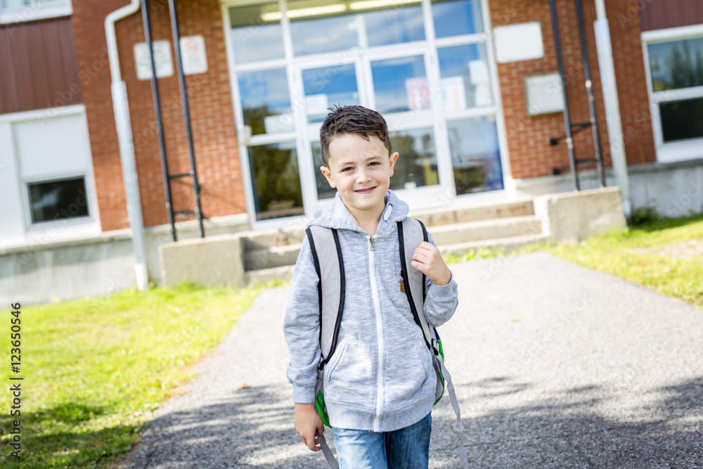 Obraz premium student outside school standing smiling