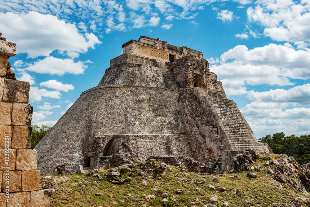 view from nunnery to Pyramid of the Magician in ancient mayan uxmal ruins, mexico view from nunnery to Pyramid of the Magician in ancient mayan uxmal ruins, mexico