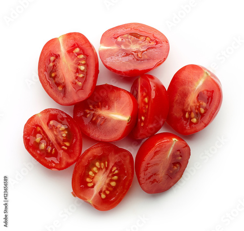 Cherry tomato halves isolated on white, from above
