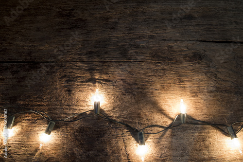 Christmas background - vintage planked wood with lights and free © ijeab
