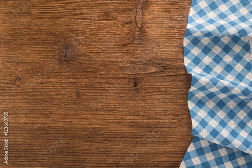 Tablecloth textile on wooden background 