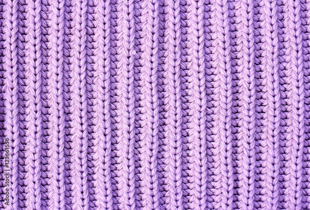 Violet knitted textured background.