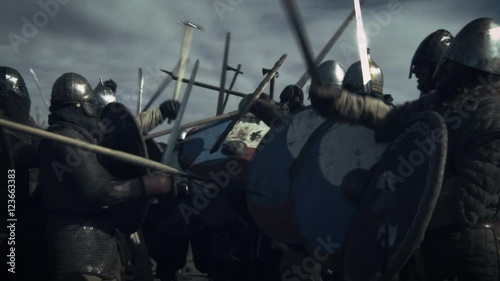 Large Battle Between Medieval Warriors. Medieval Reenactment. Shot on RED Cinema Camera in 4K (UHD).