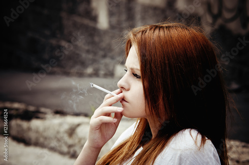 Smoking beautiful young girl