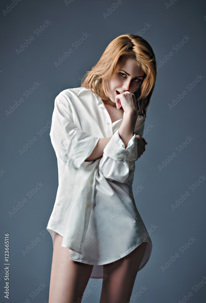Studio portrait of sexy young girl wearing white shirt Studio portrait of sexy young girl wearing white shirt