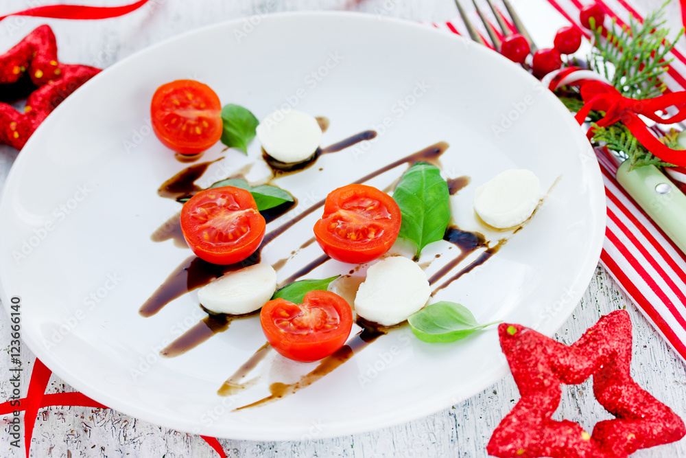 Holiday tree shaped caprese salad - festive christmas food Holiday tree shaped caprese salad - festive christmas food