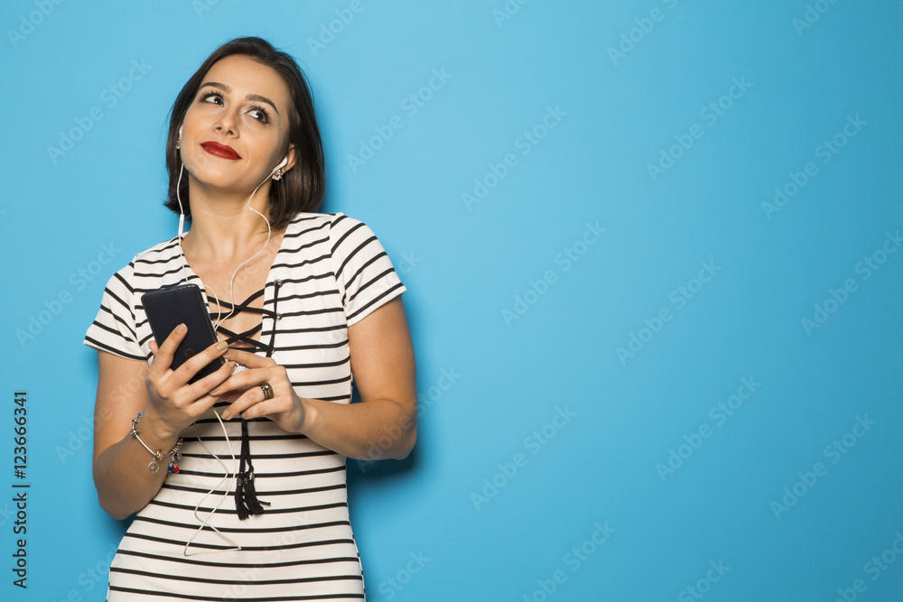 beautiful Brazilian girl enjoying music with the head phones beautiful Brazilian girl enjoying music with the head phones