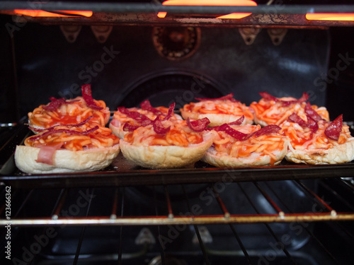 Pizza Buns Under An Oven Grill