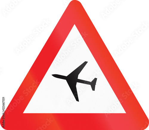 Belgian warning road sign - plane over road
