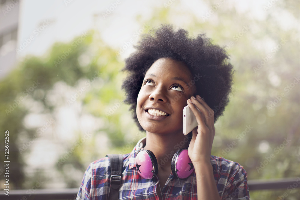 Happy african american woman on the phone outdoors Happy african american woman on the phone outdoors