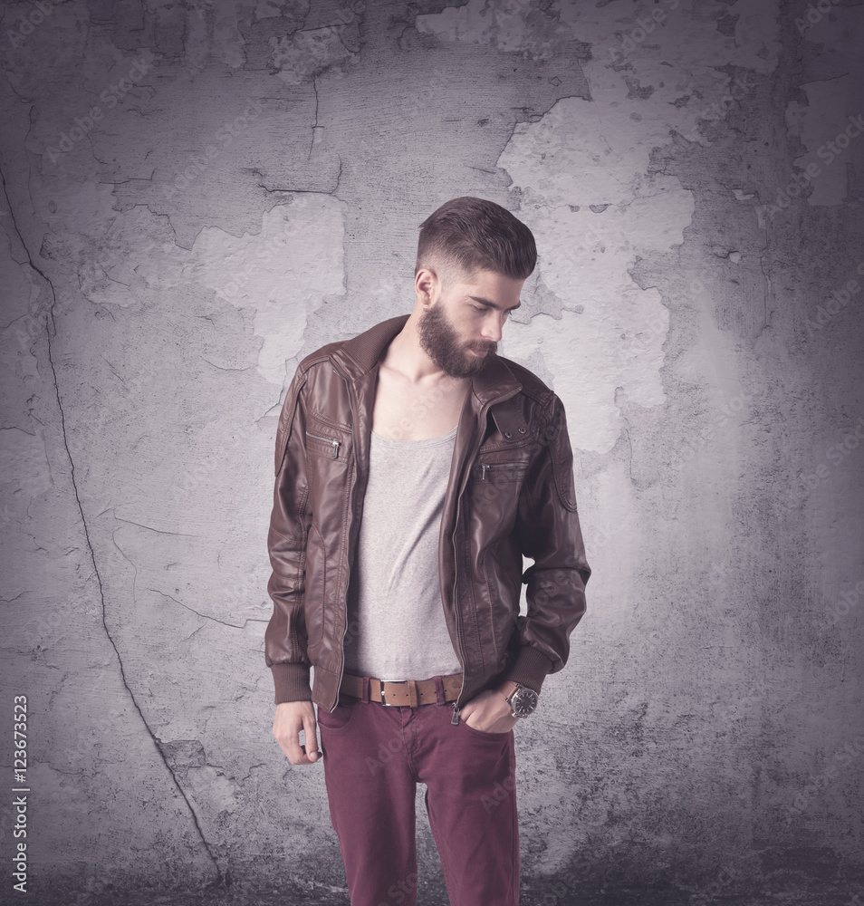 Handsome hipster in fashion clothing