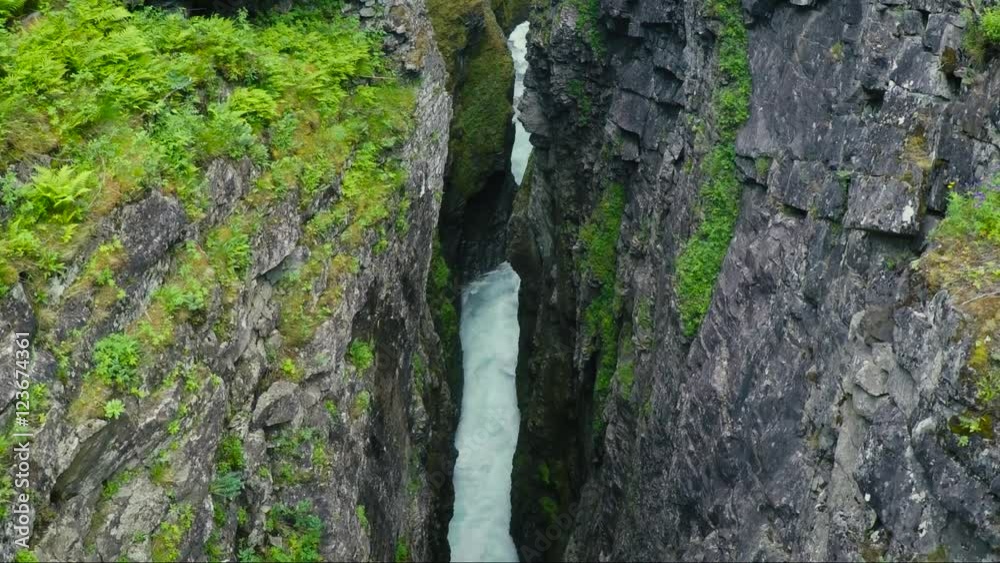 Aerial Shot of Fast Moving River Between Steep Rocks Aerial Shot of Fast Moving River Between Steep Rocks
