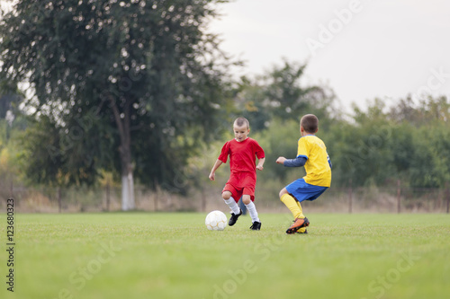 Little soccer player in action