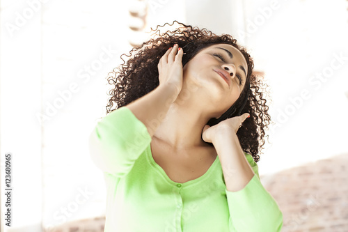 African american woman smiling with headphones