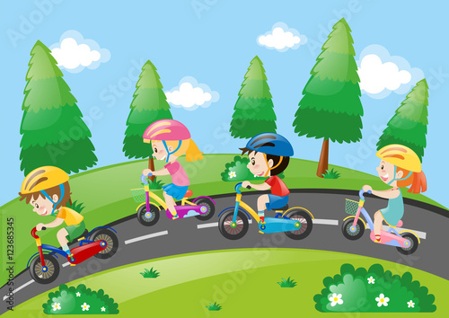Children riding bicycle in the park